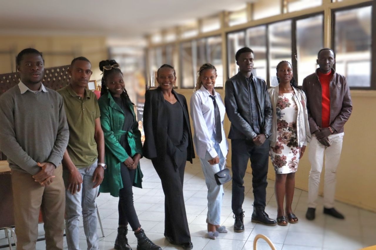 Group of diverse students learning happily